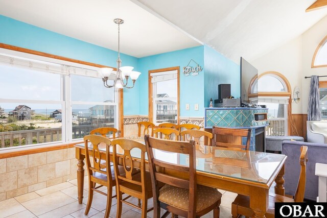 23212 Sea Oats Dr Lot 18, Rodanthe, NC 27968 - dining room featuring wainscoting and a notable chandelier