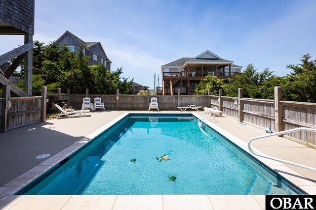 23212 Sea Oats Dr Lot 18, Rodanthe, NC 27968 - view of swimming pool with a fenced in pool, a fenced backyard, and a patio area