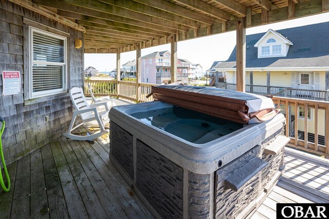 23212 Sea Oats Dr Lot 18, Rodanthe, NC 27968 - wooden deck with a hot tub and a residential view