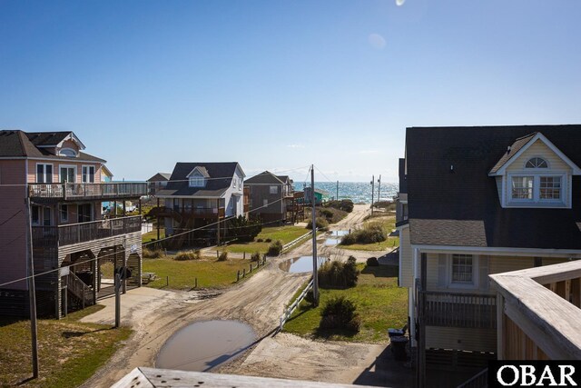 23212 Sea Oats Dr Lot 18, Rodanthe, NC 27968 - view of road featuring a water view and stairway