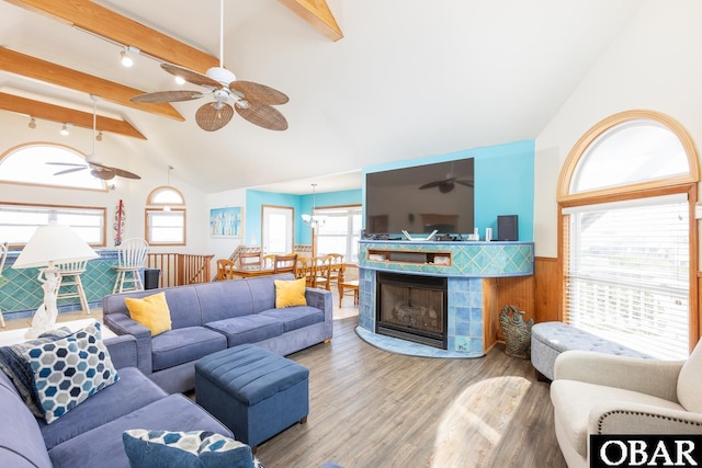 23212 Sea Oats Dr Lot 18, Rodanthe, NC 27968 - living room featuring ceiling fan, beam ceiling, plenty of natural light, a wainscoted wall, and wood finished floors