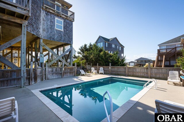 23212 Sea Oats Dr Lot 18, Rodanthe, NC 27968 - view of pool featuring stairway, a fenced in pool, a fenced backyard, and a patio area