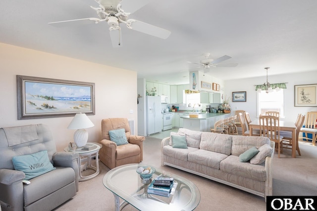 2603 Bay Dr Lot 3, Kill Devil Hills, NC 27948 - living area with ceiling fan, light carpet, and a chandelier