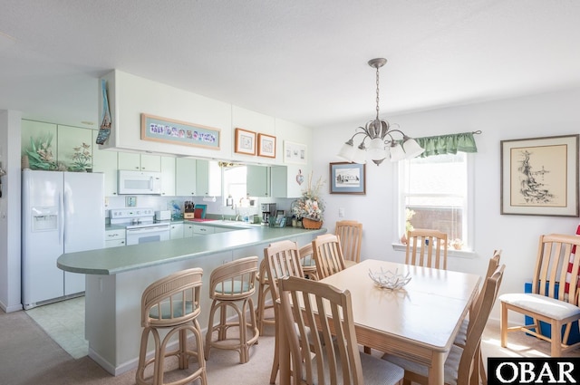 2603 Bay Dr Lot 3, Kill Devil Hills, NC 27948 - dining room featuring a chandelier