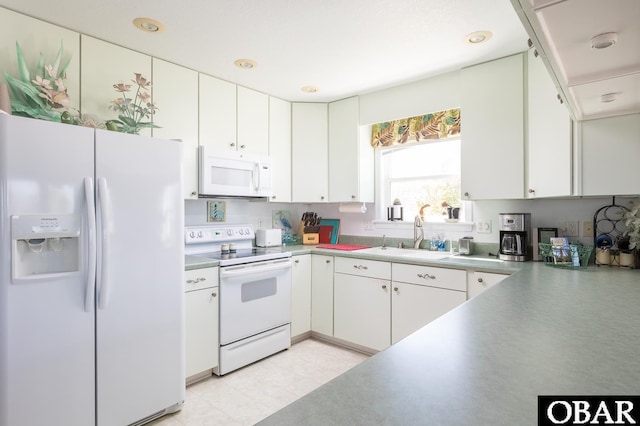 2603 Bay Dr Lot 3, Kill Devil Hills, NC 27948 - kitchen featuring white appliances, white cabinets, light countertops, and recessed lighting