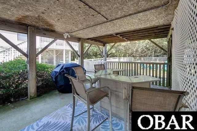 view of patio with fence and grilling area