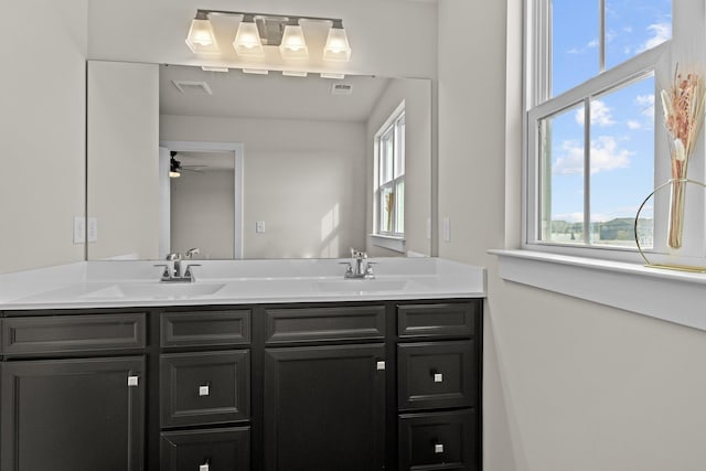 104 Garland St Lot 3, Moyock, NC 27958 - bathroom with double vanity, visible vents, a sink, and a ceiling fan