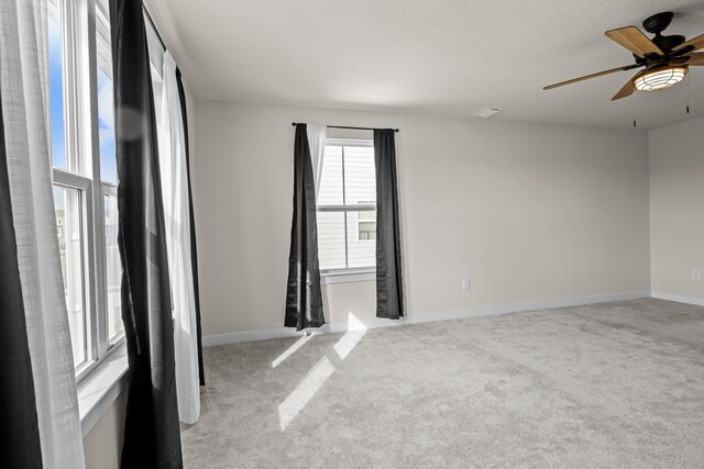 104 Garland St Lot 3, Moyock, NC 27958 - carpeted spare room featuring baseboards and a ceiling fan