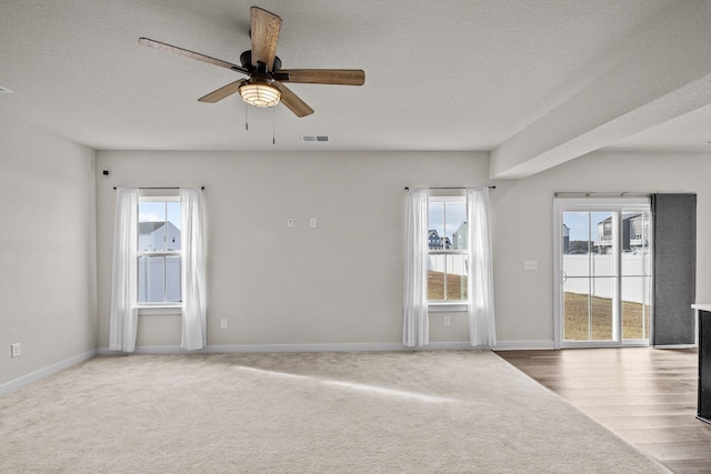 104 Garland St Lot 3, Moyock, NC 27958 - unfurnished room featuring ceiling fan, carpet, and baseboards