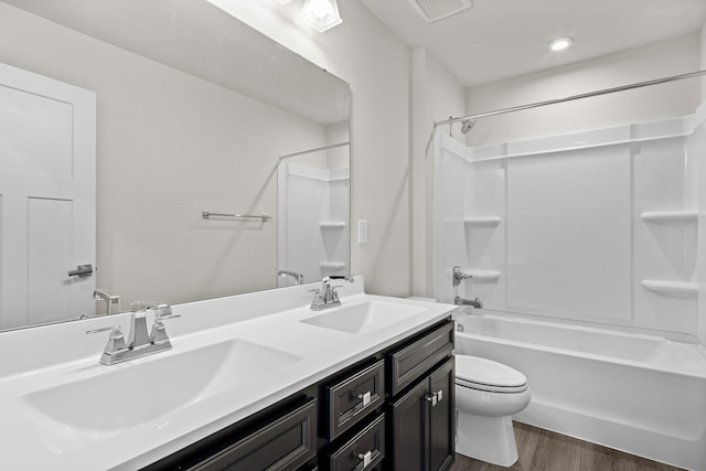 104 Garland St Lot 3, Moyock, NC 27958 - bathroom featuring visible vents, a sink, toilet, and wood finished floors