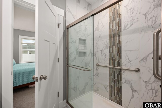 1304 Harpoon Dr Lot # 70, Kill Devil Hills, NC 27948 - full bathroom featuring connected bathroom and a marble finish shower