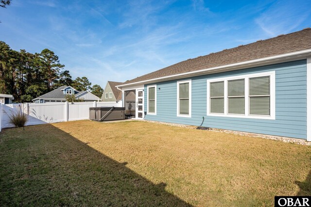 1304 Harpoon Dr Lot # 70, Kill Devil Hills, NC 27948 - back of property with a hot tub