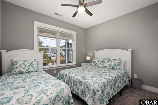 1304 Harpoon Dr Lot # 70, Kill Devil Hills, NC 27948 - carpeted bedroom with ceiling fan and baseboards