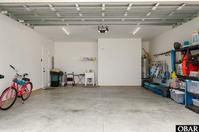 1304 Harpoon Dr Lot # 70, Kill Devil Hills, NC 27948 - garage with electric water heater, a garage door opener, and a sink