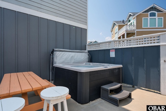 view of patio featuring a hot tub