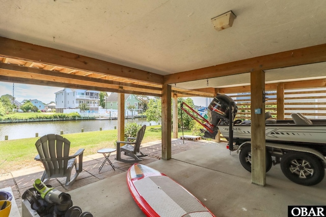 view of patio featuring a water view
