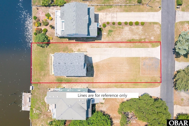 aerial view of property and surrounding area featuring property boundaries highlighted
