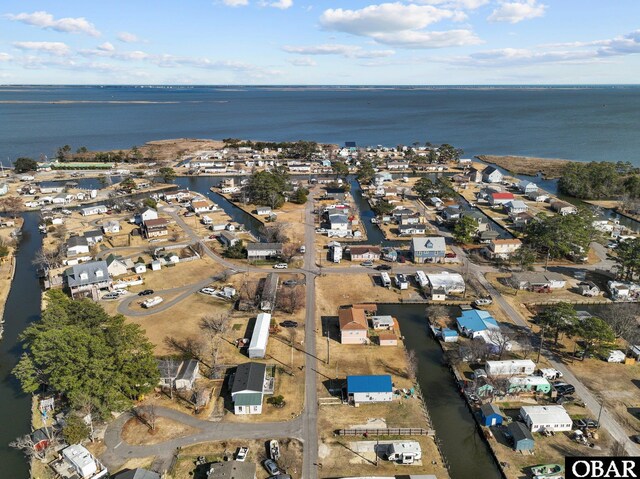 aerial view with a residential view and a water view