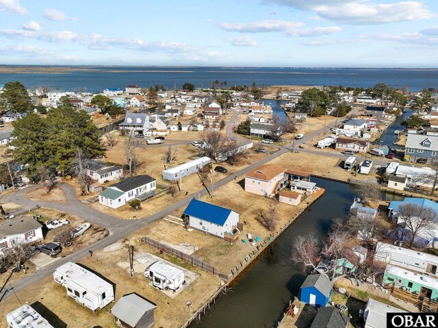 aerial view with a residential view and a water view