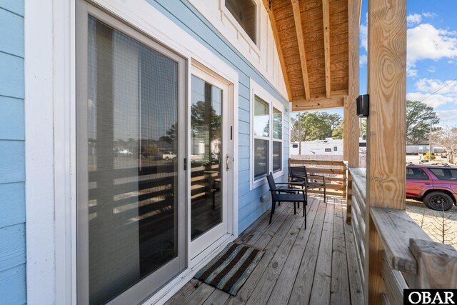 wooden terrace with covered porch