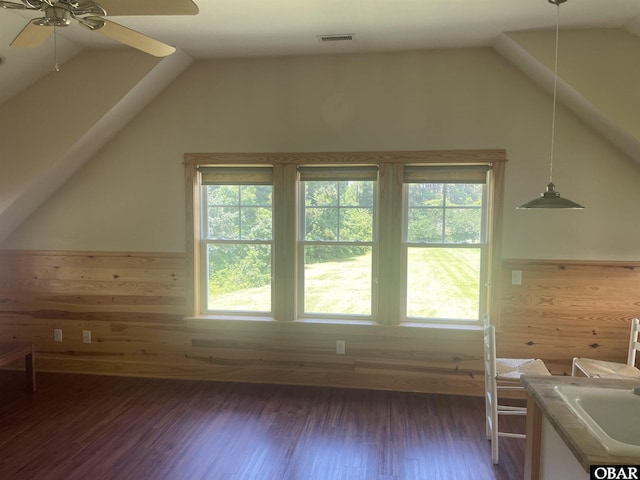 102 Daybreak Ct Lot # 53, Grandy, NC 27939 - additional living space with vaulted ceiling, ceiling fan, wood walls, dark wood-style flooring, and wainscoting