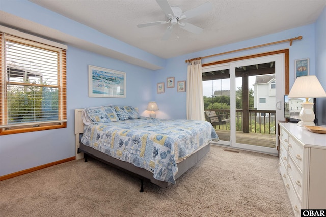 629 Sanderling Trl Lot 51, Corolla, NC 27927 - bedroom with light carpet, access to outside, baseboards, and a ceiling fan