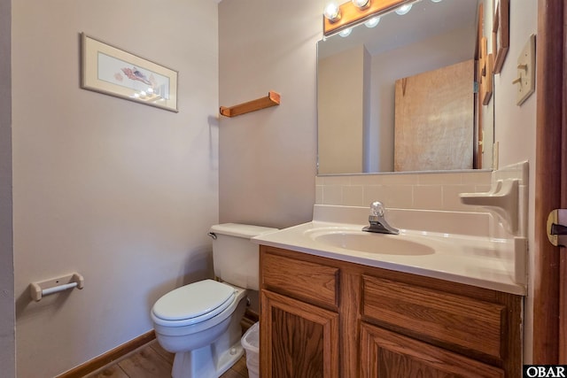 629 Sanderling Trl Lot 51, Corolla, NC 27927 - half bath featuring toilet, vanity, and backsplash