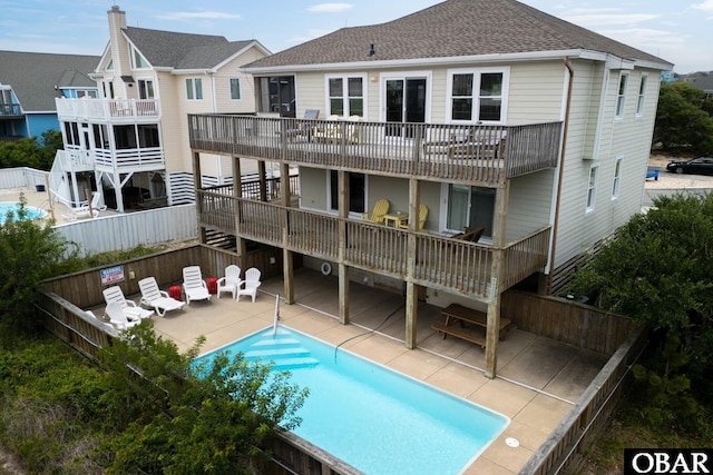 629 Sanderling Trl Lot 51, Corolla, NC 27927 - rear view of property featuring roof with shingles and a patio