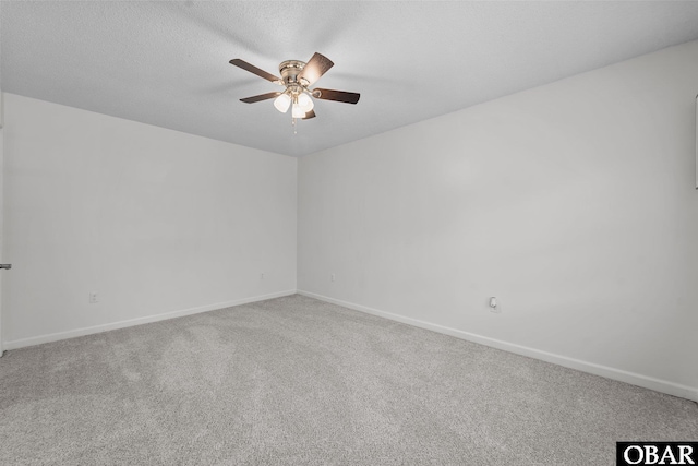1095 Burnside Rd Lot B3, Manteo, NC 27954 - empty room featuring carpet, ceiling fan, baseboards, and a textured ceiling