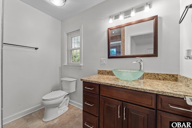 1095 Burnside Rd Lot B3, Manteo, NC 27954 - bathroom featuring baseboards, vanity, and toilet