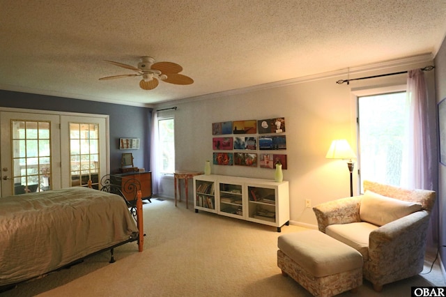 509 Telegraph Ct Lot 17, Kill Devil Hills, NC 27948 - carpeted bedroom with crown molding, a textured ceiling, ceiling fan, baseboards, and access to exterior
