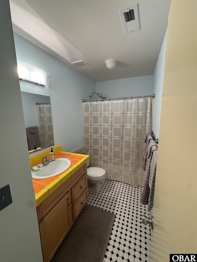 509 Telegraph Ct Lot 17, Kill Devil Hills, NC 27948 - full bathroom featuring toilet, vanity, and a shower with shower curtain