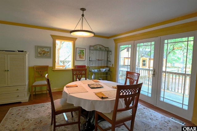 509 Telegraph Ct Lot 17, Kill Devil Hills, NC 27948 - dining area featuring plenty of natural light, wood finished floors, and baseboards
