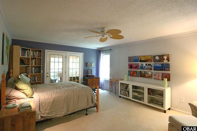 509 Telegraph Ct Lot 17, Kill Devil Hills, NC 27948 - bedroom with crown molding, carpet floors, a textured ceiling, ceiling fan, and access to outside