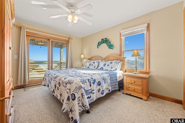 bedroom featuring light carpet, access to outside, ceiling fan, and baseboards