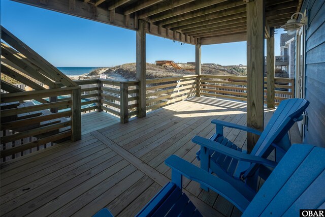 deck featuring a water view