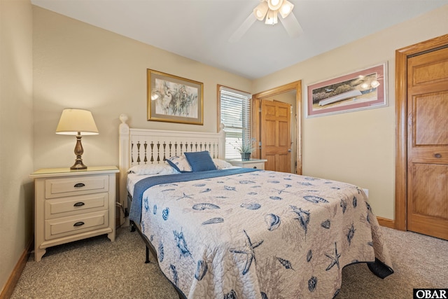 bedroom with light colored carpet, ceiling fan, and baseboards