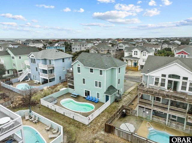 drone / aerial view with a residential view