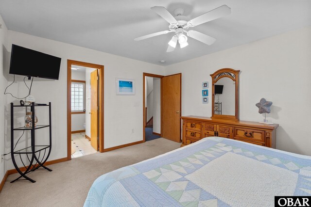 bedroom featuring light carpet, ceiling fan, and baseboards