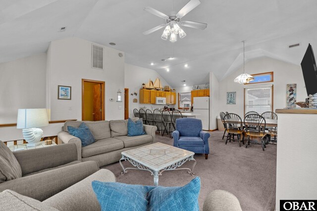 living room featuring light carpet, ceiling fan, high vaulted ceiling, and visible vents