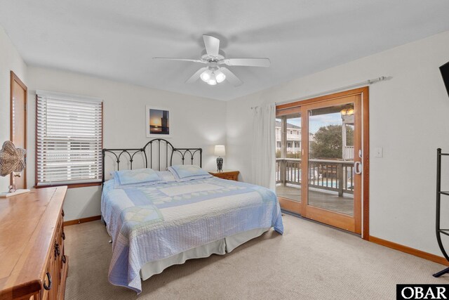 bedroom featuring light carpet, access to outside, baseboards, and ceiling fan