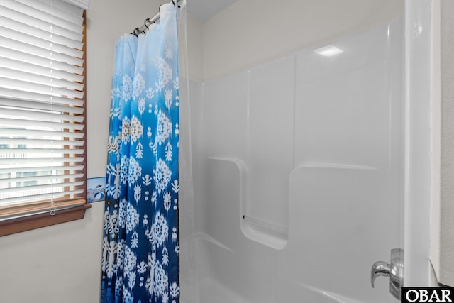 bathroom with a shower with curtain