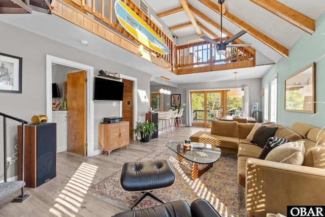 100 Tides Dr Lot 1, Duck, NC 27949 - living area with high vaulted ceiling, light wood-style flooring, beamed ceiling, a ceiling fan, and a chandelier