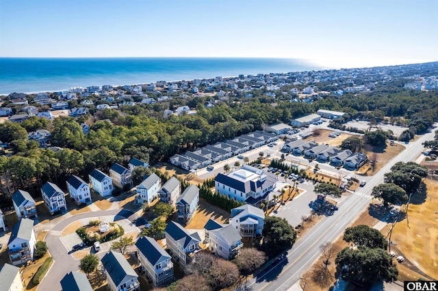 bird's eye view with a water view and a residential view