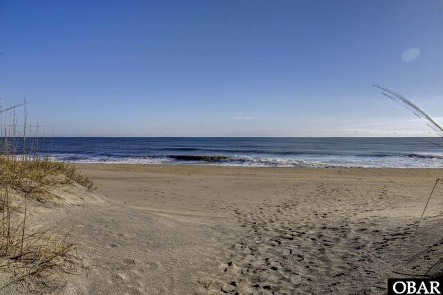 water view featuring a beach view