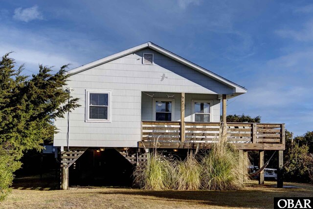 view of front of property with a carport