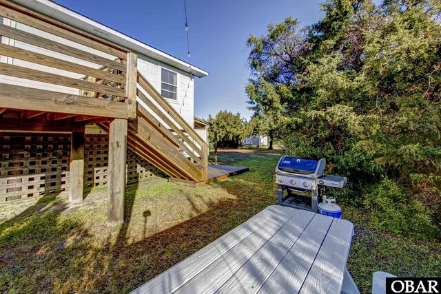 view of yard featuring stairway