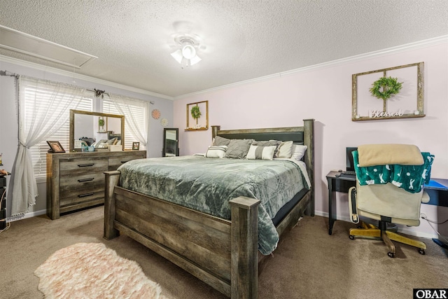 bedroom with carpet floors, crown molding, attic access, a textured ceiling, and baseboards