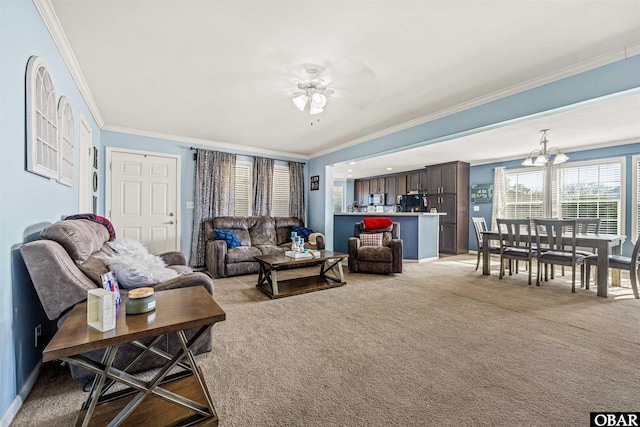 living room featuring light colored carpet, crown molding, and ceiling fan with notable chandelier