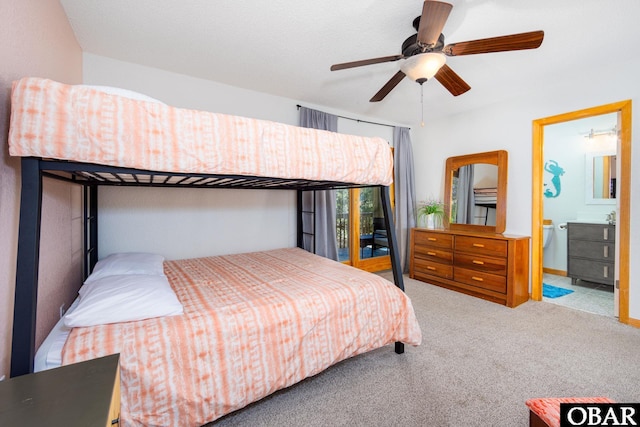 761 Bayberry Ct Lot 119, Corolla, NC 27927 - carpeted bedroom featuring ceiling fan and ensuite bath